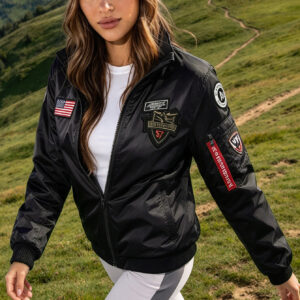 Women's outdoor sports jacket black patchwork utility bomber jacket features a stand collar, front zip closure, elasticated cuffs and hem, and multiple decorative patches on the chest and sleeves.